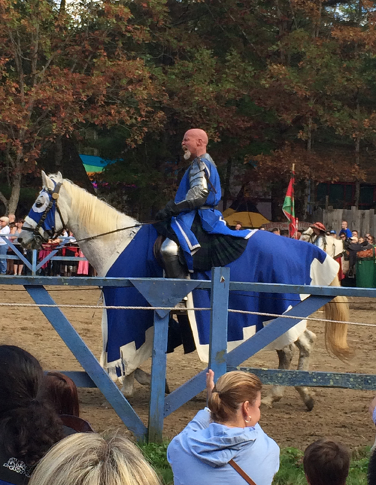 Scottish knight wearing kilt at joust