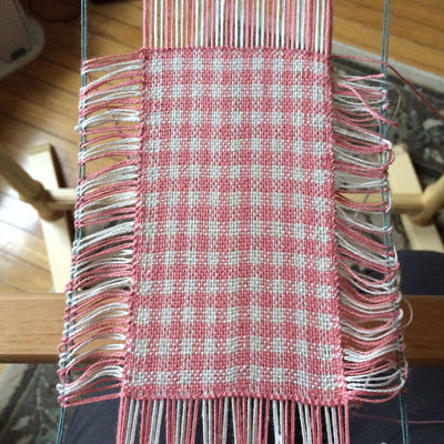 Peach and cream rigid heddle woven doll placemats in Valley Yarns 8/2 Cotton