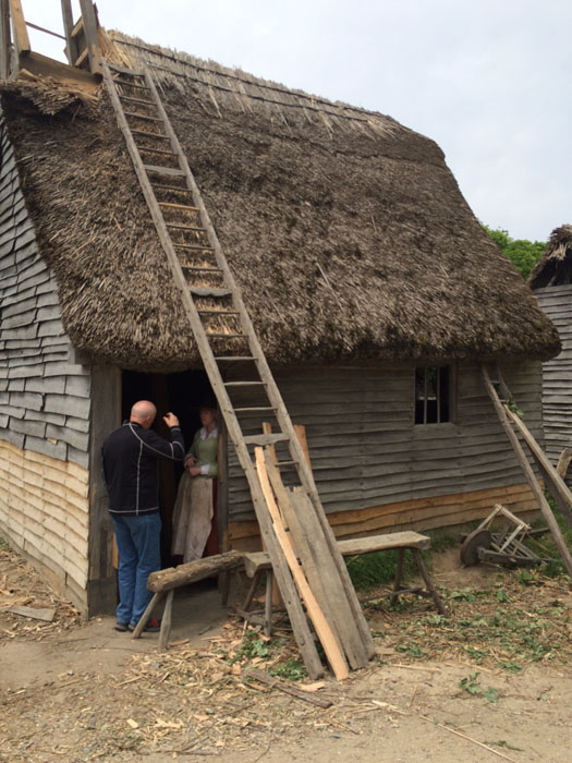 House with roof being repaired at Plimoth Plantation