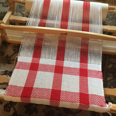 rigid heddle woven tea towels being worked on the kromski harp loom
